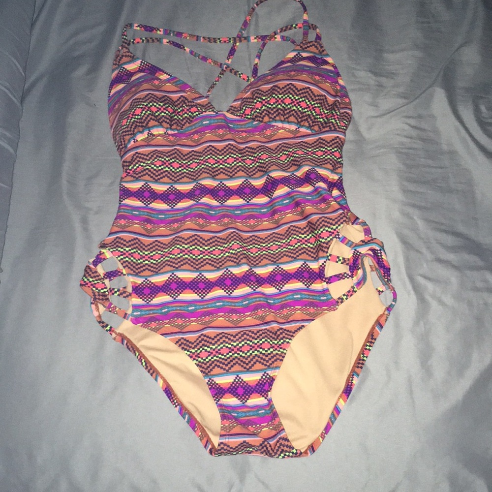 One piece bathing suit.... used only once